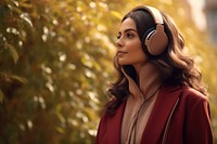 Qatari woman headphones listening portrait.