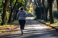 Fat woman jogging running adult athleticism.