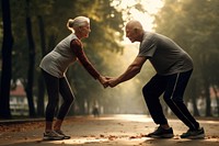 Old couple stretching adult togetherness retirement.