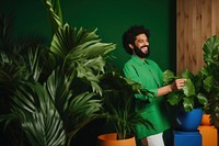 Plant shop laughing adult smile. AI generated Image by rawpixel.