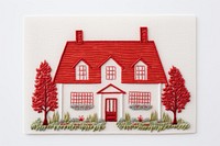White-red house in embroidery style architecture needlework building.