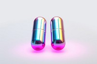Two iridescent medicine capsules pill white background medication. AI generated Image by rawpixel.