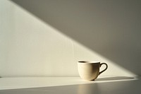 A coffee cup shadow drink light.