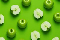  Green apple slices pattern green backgrounds plant. AI generated Image by rawpixel.