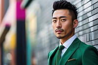 Asian businessman in a green suit adult individuality architecture.
