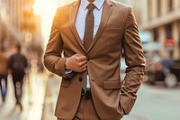 Businessman in a brown suit blazer jacket architecture.