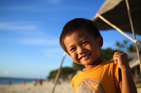Filipino kid beach portrait outdoors.