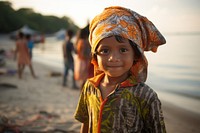 Indonesian kid beach portrait outdoors.