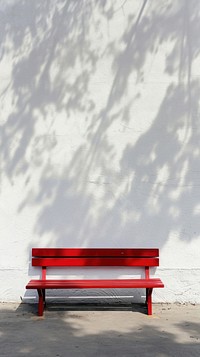 A red bench furniture shadow wall.