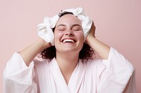 Chubby woman tying her hair with rubber band smile adult happy. AI generated Image by rawpixel.