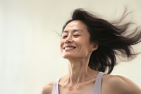 Mature asian american woman laughing smile adult. AI generated Image by rawpixel.