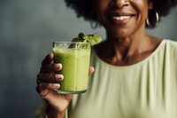 Drinking green juice smoothie smile refreshment. AI generated Image by rawpixel.