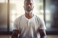 Mature guy meditating adult contemplation spirituality. AI generated Image by rawpixel.
