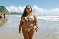 Chubby Pacific Islander woman walk on the beach outdoors swimwear vacation.