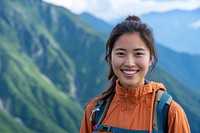 Asian woman backpacking adventure mountain.