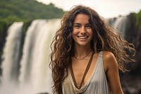 Brazilian woman waterfall laughing outdoors.