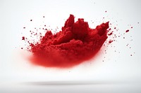 Pigment powder red splattered exploding.
