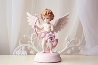 Angel cupid figurine toy representation.