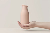 Hand holding color bottle pottery vase hand.