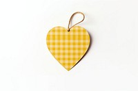 Yellow checked pattern heart shaped paper gift tag white background accessories decoration.