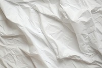  Crinkled paper backgrounds white material. AI generated Image by rawpixel.