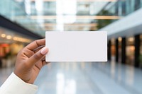 Hand holding blank name card photo architecture electronics.