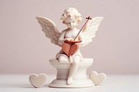 Angel cupid figurine white representation.
