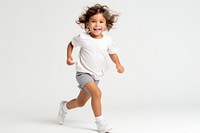 Child running shorts white background exercising.