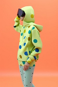 A young adult in a colorful polka-dot hoodie wearing virtual reality glasses fashion cartoon representation. AI generated Image by rawpixel.