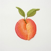 A peach in embroidery style fruit plant leaf.