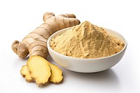 Ginger root and ginger powder in a bowl spice plant food. AI generated Image by rawpixel.