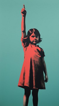 A latina brazilian little girl pointing her finger to the side opposite to her portrait red representation. 