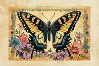 Vintage postage stamp with butterfly insect animal flower.