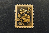 Vintage postage stamp with floral gold needlework embroidery.