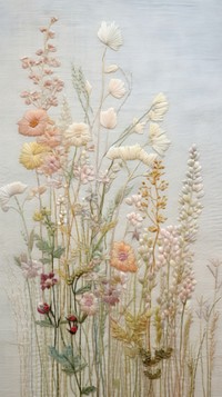 Embroidery with meadow flowers needlework painting textile.