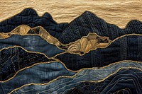 Embroidery with mountain black and gold pattern textile quilt.