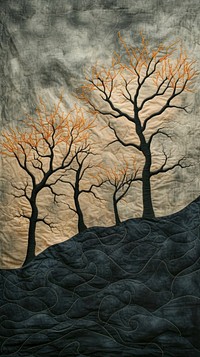 Embroidery with dry trees on dark sky plant craft art.