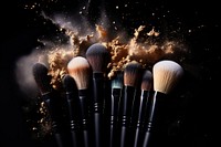 Makeup brushes are sprinkled with powder cosmetics black background exploding. AI generated Image by rawpixel.
