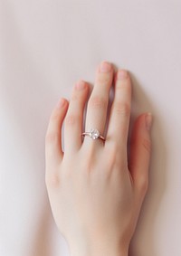  Diamond ring hand jewelry. AI generated Image by rawpixel.
