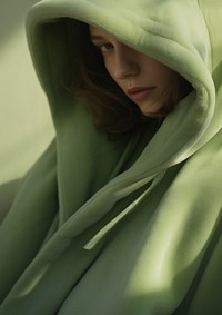  A person wearing casual green winter coat portrait fashion adult. 