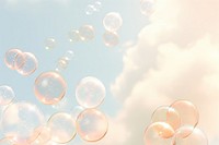 A group of soap bubbles floating in the cloud sky backgrounds lightweight transparent.