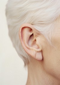 A elderly woman ear jewelry earring adult.