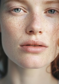 A middle age face skin with lip freckle hairstyle forehead.