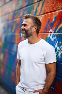 Happy american middle age man wearing white t-shirt smile adult men.