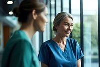Mature female nurse hospital adult togetherness. AI generated Image by rawpixel.