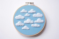 Embroidery cloud blue white fabric.