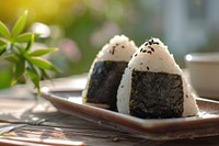 Extreme close up of Onigiri food sushi table.