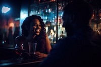 Oung adults black people bar nightlife illuminated.