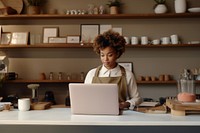 Black woman laptop computer small business.