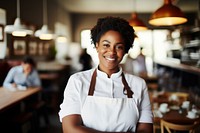 Chubby black female chef restaurant smiling entrepreneur.